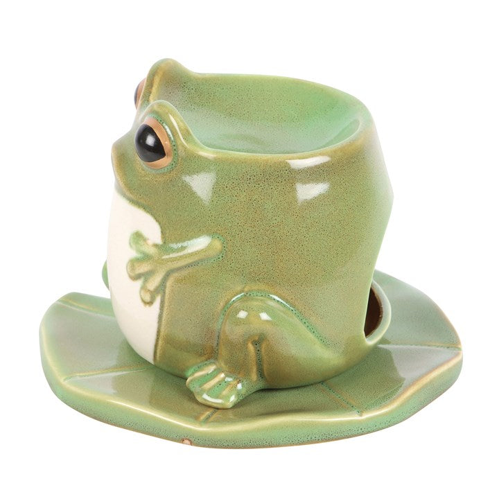 Ceramic frog-shaped cup and saucer on a white background