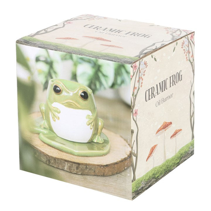 Ceramic frog oil burner in packaging with floral design
