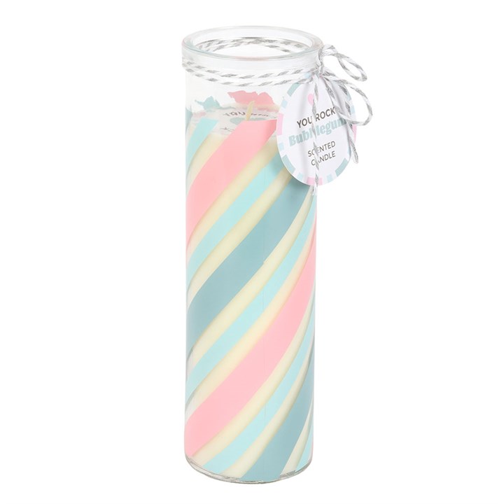 Pastel striped baby blanket in a glass jar with a tag on a white background