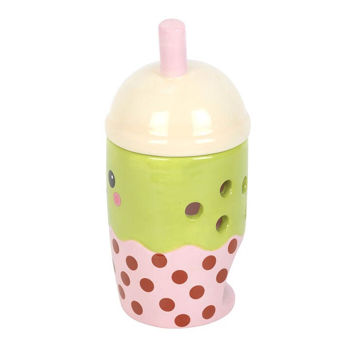 Children's cup with polka dot design on a white background