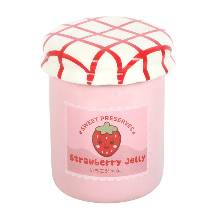 Pink jar of strawberry jelly with a decorative lid on a white background