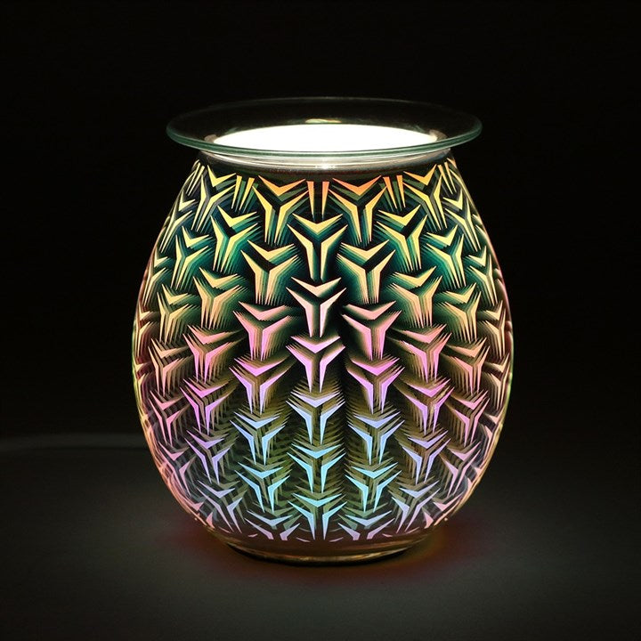 Decorative wax warmer with geometric pattern on a black background
