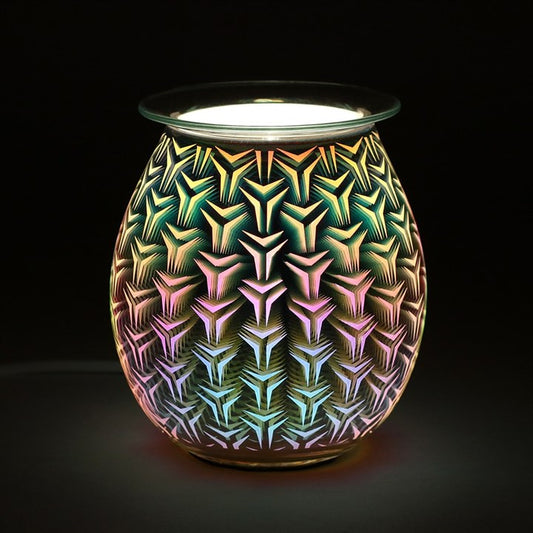 Decorative wax warmer with geometric pattern on a black background