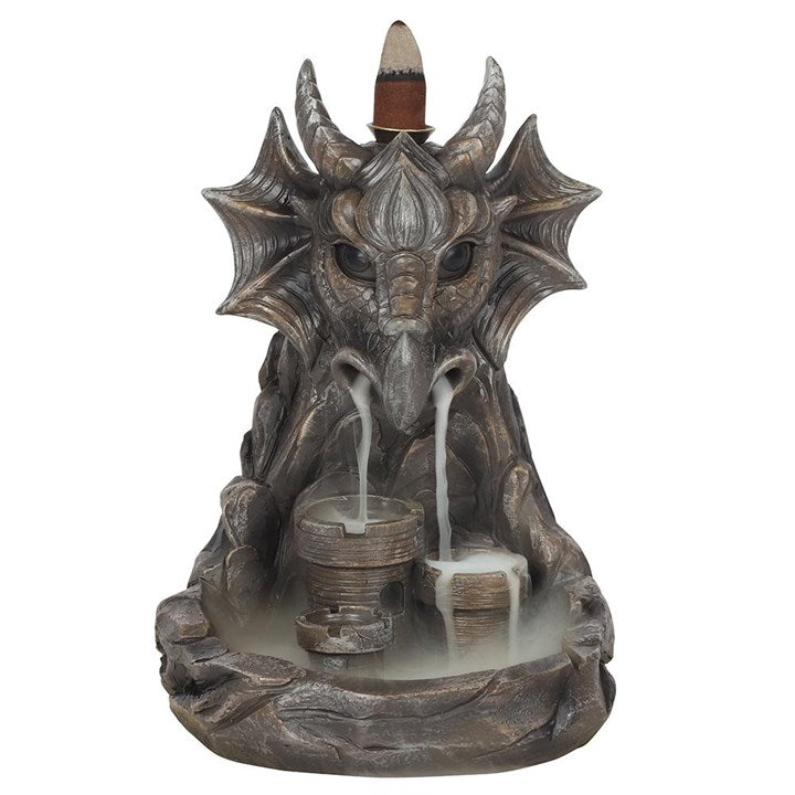 Dragon-shaped incense burner with water fountain effect on a white background