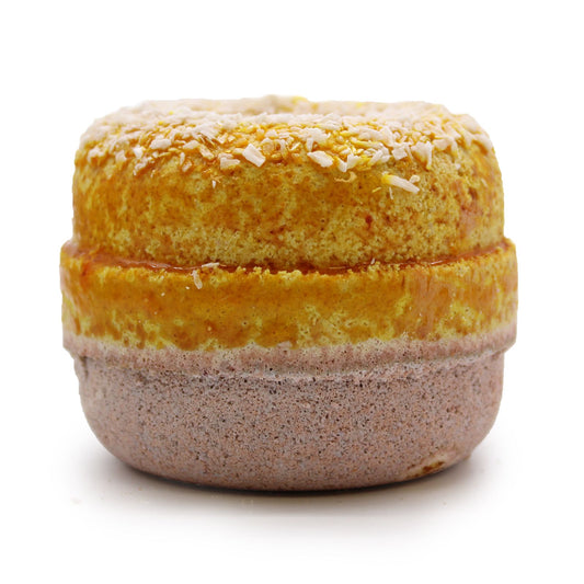 Two layered dessert bath bomb with yellow and brown colors on a white background