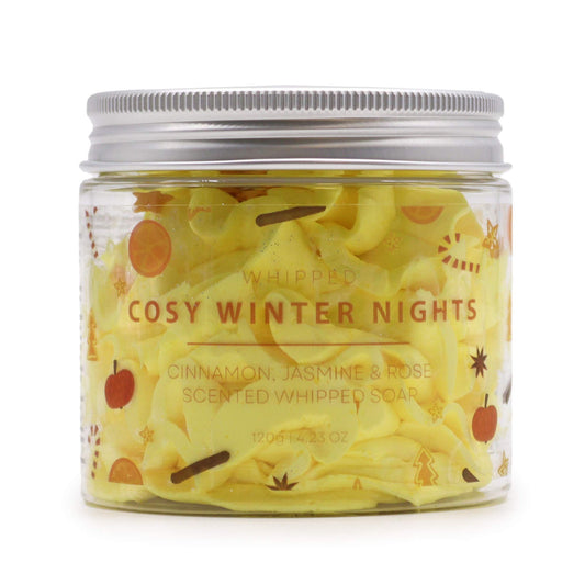Jar of 'Whipped Cosy Winter Nights' scented whipped soap with cinnamon, jasmine, and rose elements on a white background.