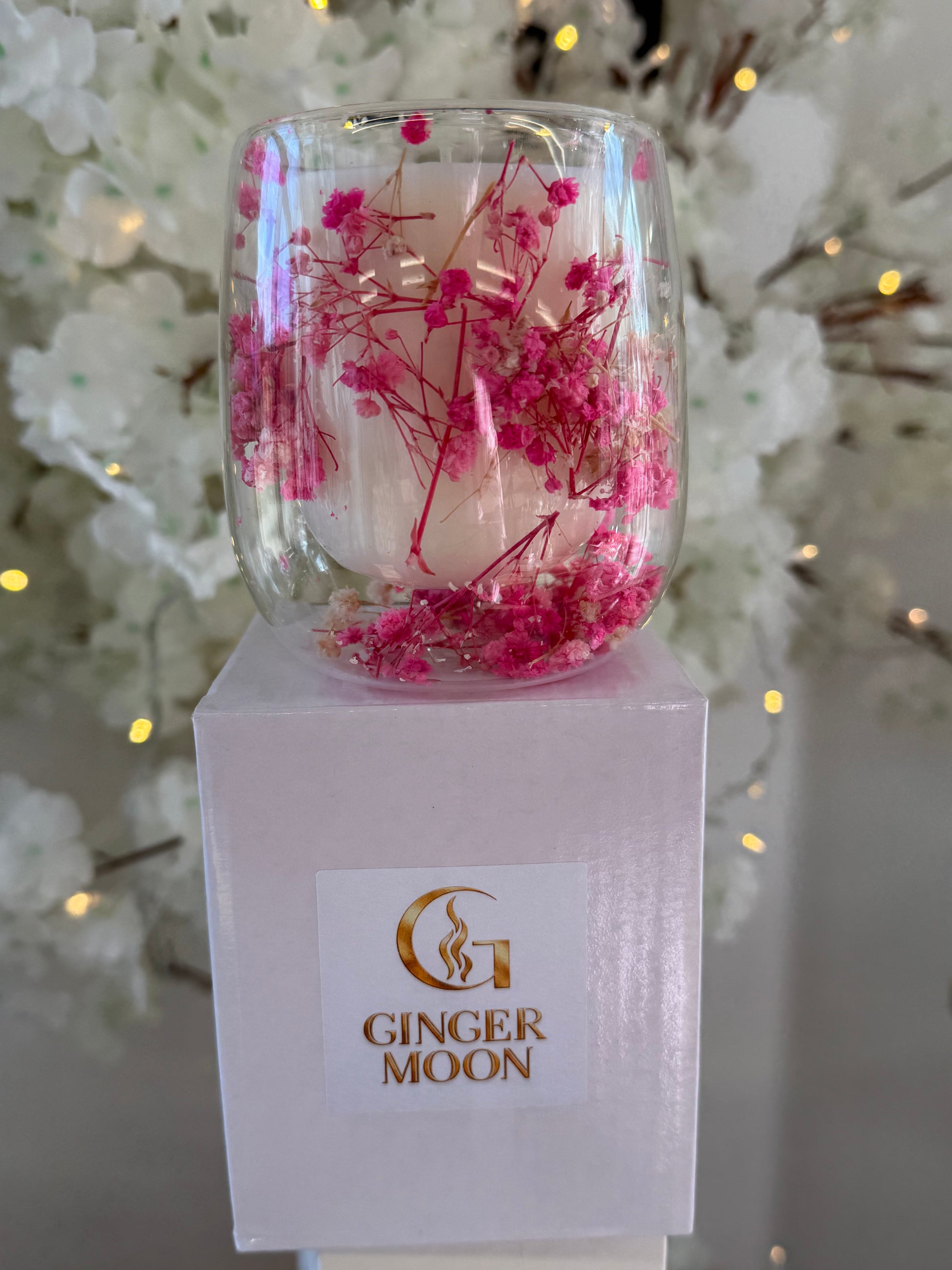 glass jar candle with pink flowers 