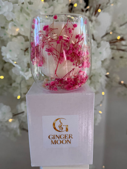 glass jar candle with pink flowers 