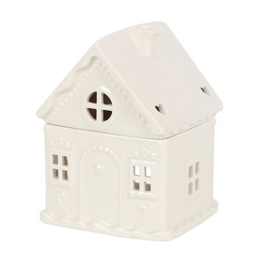 White ceramic house-shaped lantern on a white background