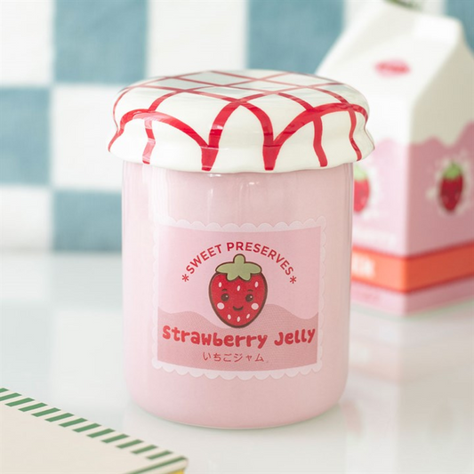 Jar of strawberry jelly with a decorative lid on a checkered background